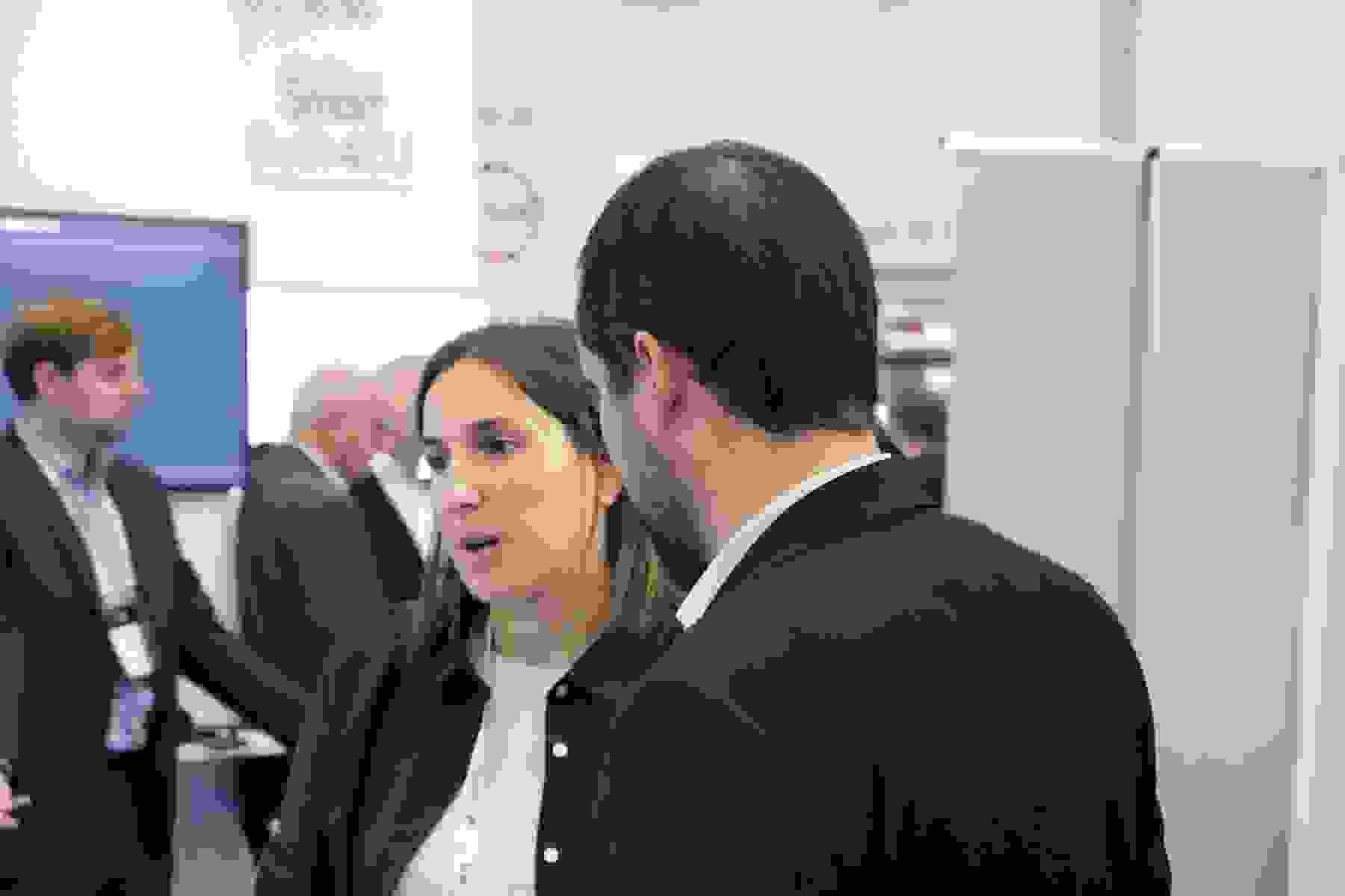 People talking at Graphene Flagship Enlit Europe booth